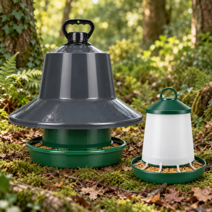 Poultry and game bird feeders with a BEC King feeder and smaller poultry feeder in woodland